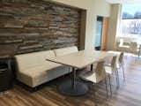 E&S Nokomis Tile in a modern office - https://www.eandstile.com/rawhide-real-wood-panels/