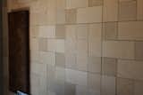 E&S Baltic Birch Tile - Plateaux Series 
https://www.eandstile.com/plateaux-plywood-walls/