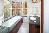 Bath Room, Granite Counter, Limestone Floor, Drop In Sink, Open Shower, Recessed Lighting, Stone Tile Wall, One Piece Toilet, and Whirlpool Tub Master Bathroom  Photo 1 of 7 in Contemporary home and furniture designs. by Robert Nichols