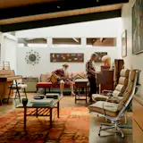 The music room features mid-century modern instruments including a Baldwin Acrosonic piano and a Hammond B3