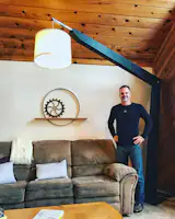 Hangman's Lamp. 8' tall, 8' reach, 150 lbs of birch ply and steel. Sho sugi ban toasted finish. 