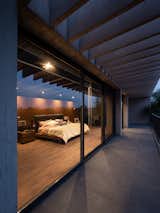 Outdoor, Hanging Lighting, Rooftop, and Concrete Fences, Wall concrete pergola  Photo 1 of 39 in Saquila by Magaña Calderón