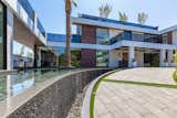 Bundy Drive Los Angeles luxury home front entry pond landscape design
