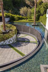 Bundy Drive Los Angeles modern home circular driveway & entry pond