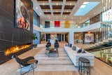 Bundy Drive Los Angeles modern home art filled open plan living room