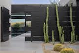 BigHorn Palm Desert modern architectural home front gate with cactus landscaping