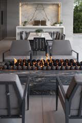 BigHorn Palm Desert luxury home terrace dining table, fire pit & outdoor kitchen