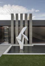 Serenity Indian Wells modern architectural luxury home Richard Erdman entry sculpture