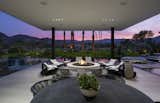 Serenity Indian Wells luxury desert home outdoor covered terrace with fire pit lounge
