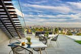 Los Tilos Hollywood Hills luxury home modern outdoor dining terrace with city views