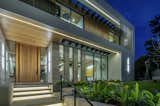 Hutton Drive 2641 Beverly Hills luxury modern home front door entrance with glass walls and ribbon windows