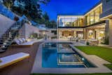 Hutton Drive 2641 Beverly Hills luxury resort style home with modern indoor outdoor design that opens onto a backyard pool terrace
