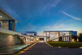 Benedict Canyon Beverly Hills luxury mansion with modern wraparound design and water features