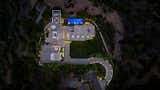 Benedict Canyon Beverly Hills modern mansion and lighted private driveway aerial view