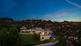 Benedict Canyon Beverly Hills modern mansion with studio and hillside infinity pool night