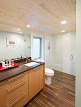 Bath Room, Engineered Quartz Counter, Porcelain Tile Floor, Undermount Sink, Ceiling Lighting, Ceramic Tile Wall, Two Piece Toilet, and Open Shower Bathroom in master suite addition. Custom white oak vanity by AvenueTwo:Design. Zero threshold shower.   Photo 2 of 7 in Jersey Way Residence by Design Platform