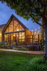 Expansion and open patio area alongside enclosed dining room. Corten metal roofing and siding. Steel structure designed by Studio NYL. Lead Architect for Design Platform was Caroline Wilding.