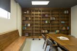 Staff library. Custom made bookshelves, benches, and table tops by Vogo. 