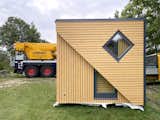 Exterior, Shingles Roof Material, Shed RoofLine, Cabin Building Type, and Wood Siding Material  Photo 2 of 15 in The Unfolding of a Railway House by Brette Haus