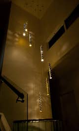 Heavy Rain is a larger, more commanding version of Rain, suitable for voids with high ceilings and stairwells. Heavy Rain captures the shimmery sparkle of raindrops frozen in descent. Individual drops are visually quite subtle, but gain tremendous strength when multiplied and clustered in large groups.