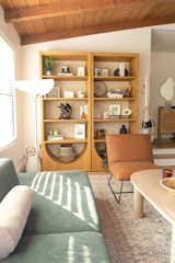 Showing off the bookcase and coat/purse rack