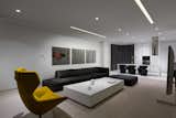 Perfect minimalism

Minimalism is a style, which needs ultimate self-discipline and perfectionism, so it fits fewer than all. But in the case of this apartment, perspective of integrity was a perfect choice. 

A young businessman, unladen with family and life, wanted to get a laconic space where coziness means functional forethought and modern comfort.

Having listened carefully to the customer, designer Yuriy Zimenko proposed to play this game with white. So, a snow-white interior has been worked out with a very specific light: ceiling is cut with shining strips, emphasizing the space.

To alleviate and diversify the impression, helped the color that was applied to the interior of the rooms with accents - carefully and accurately. The atmosphere consists of furniture of European manufacturers, were selected laconic materials of the highest quality. They look like art objects on a white background.

Several features were developed in Ukraine according to the sketches and under the strict supervision of the author Yuriy Zimenko. The image of the interior finishes perfectly matched painting.
Design Studio Yuriy Zimenko
www.Zimenko.ua
Ukraine
