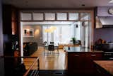 The kitchen countertop blends the old with new while also transitioning from the historical part of the house to the contemporary family room addition.  