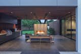 The J Series M1 Outdoor Fireplace by European Home acts as a focal point to this luxurious outdoor room.