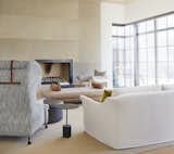 Living  room featuring high-ceilings and relaxed luxury furnishings.