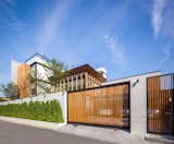 Exterior, House Building Type, Concrete Siding Material, Wood Siding Material, Flat RoofLine, Green Siding Material, and Glass Siding Material  Photo 3 of 63 in LADPRAO 80 by Black Pencils Studio