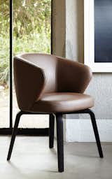 Everything is soft, everything flows. An armchair that we purposely designed without edges, as an opulent leather cushion on a fine wooden frame. MUDI is endlessly comfortable with its ecologically produced padding, leather, and belting.

Design: Gil Coste
Photo and Styling: Peter Fehrentz