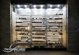 Floating bottles design trend is taking off with Genuwine Cellars' new tension cable product lines. 

Product name: Label Line