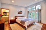 A large Master Bedroom with large windows to the views and an en-suite bath with walk-in closet.