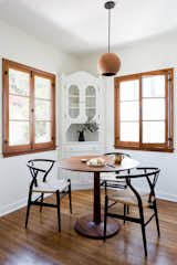 Dining Room, Table, Storage, Medium Hardwood Floor, Pendant Lighting, and Chair Breakfast Nook  Photos from Dundee Residence