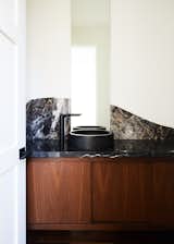Bath Room, Stone Slab Wall, Vessel Sink, and Marble Counter Powder Bathroom  Photo 16 of 20 in The Strand Residence by Jette Creative