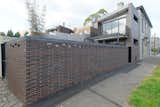 Exterior, Brick Siding Material, Metal Roof Material, House Building Type, and Flat RoofLine veiw from north west  Photo 2 of 10 in south melbourne house by aidan halloran