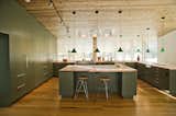 Custom Kitchen design integrated into and defining the interior architecture of this private residence in West Michigan. 