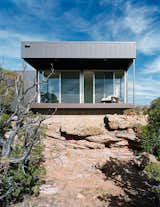 The metal panels on this home provide durable protection in this harsh environment. &nbsp;The interior is kept cool by implementing a reflective outer surface, deep covered patios and plenty of opportunities for cross-ventilation.
