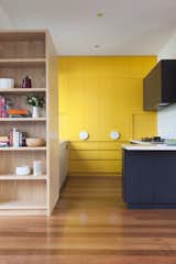 Yellow communicates happiness and is visually sunny. This bright example imbues radiant energy that is perfect for a kitchen, while a muted yellow is considered more of a soothing neutral.