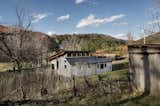 view from the south with goat barn in the foreground
