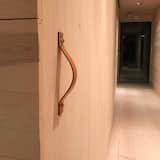 Leather handle from StudioZung NY on a self made sliding door for a wardrobe