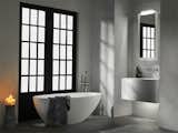 A striking addition to any bathroom environment, this award-winning 71" transitional blu∙stone™ bathtub uniquely features varying sloped angles for bathing comfort.

Sister halo model offers a more compact footprint at 63"x30"x21¾".