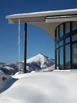 The exterior walls are clad with fire-resistant cement stucco over insulating foam board, providing a strong shoulder to gusting winds. 
