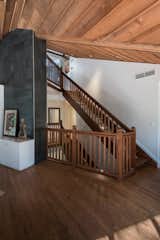 Staying respectful to the original design style, we opened an atrium leading up to the second (main) floor, adding a grander dimension to the space