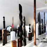 Office and Painted Wood Floor Charred cedar sculptures in the studio, afternoon light  Photo 2 of 22 in A sharper focus from my home and studio in the foothills of the Rockies in Alberta, Canada by Neshka Krusche