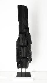 Charred wood black table sculpture by Neshka Krusche