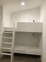 2 of 4 built in bunk beds in 3d bedroom with individual reading lights