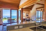 View from kitchen to dining and library/media room