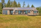 Contemporary ranch-style house with all modern amenities incl. solar, A/C all on one level