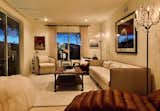 Photography by Lisa Kristine and the home owner mix with a fur beanbag chair, Parisian style sofa, leather lounge and Vivienne Westwood/Malcom McClaren Buffalo Girl’s hat. Sutro Tower is in the distance.